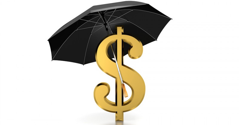Dollaro sotto un ombrello